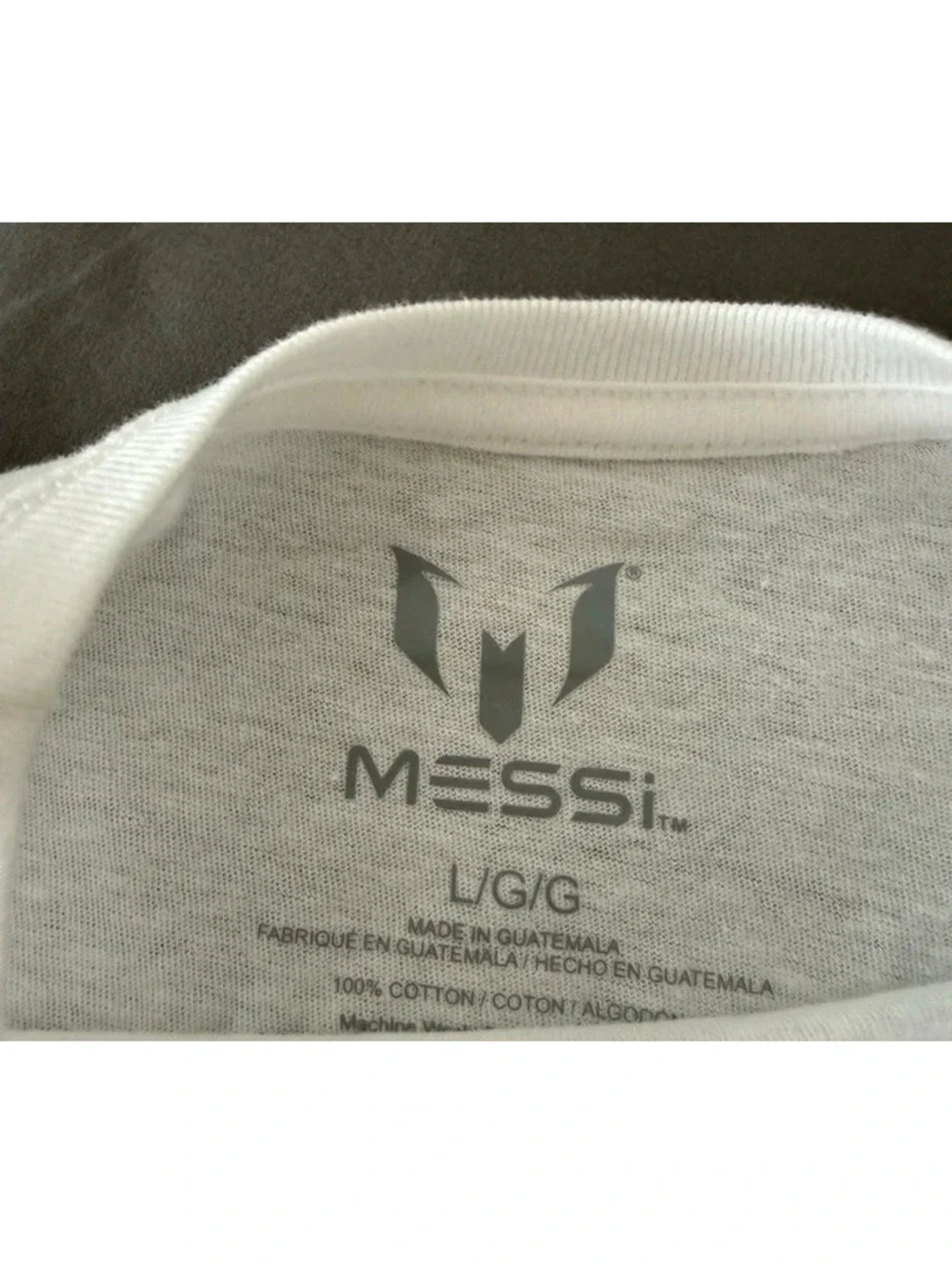 MESSI Youth Large White Graphic Soccer T-Shirt with Blue Logo